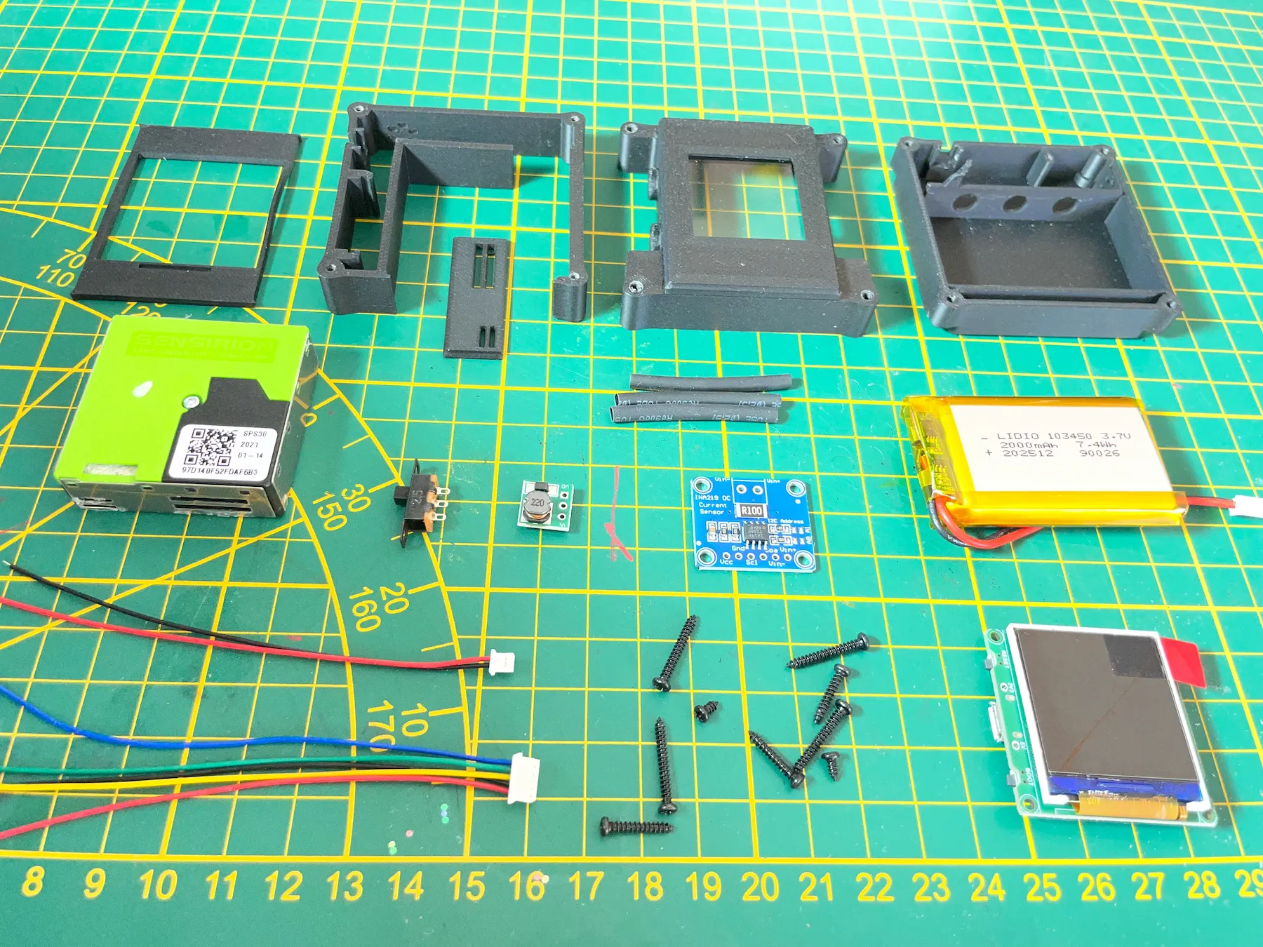 BREEZ dust sensor components laid out before assembly