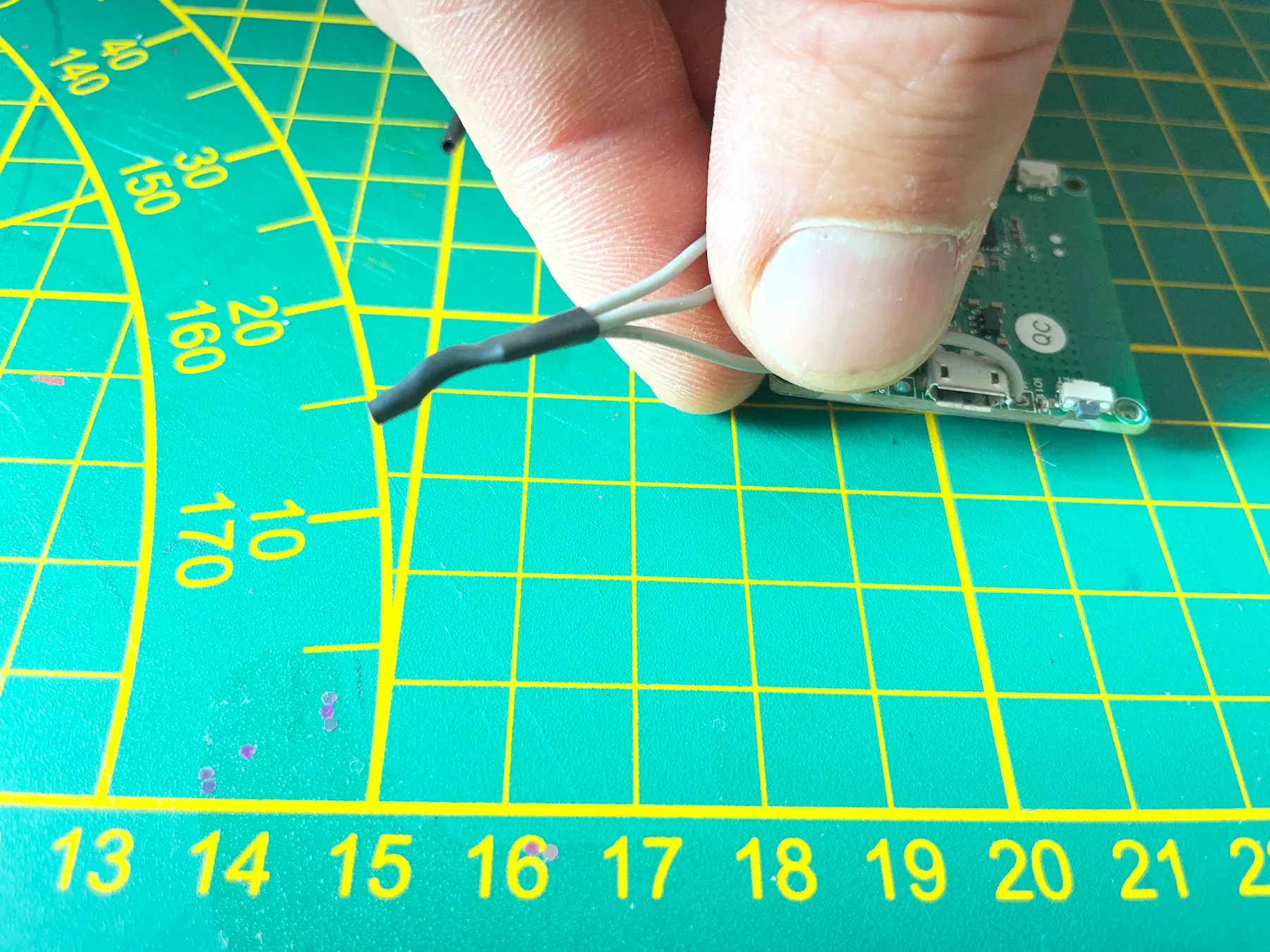 Combining multiple wires with solder and heat shrink tubing