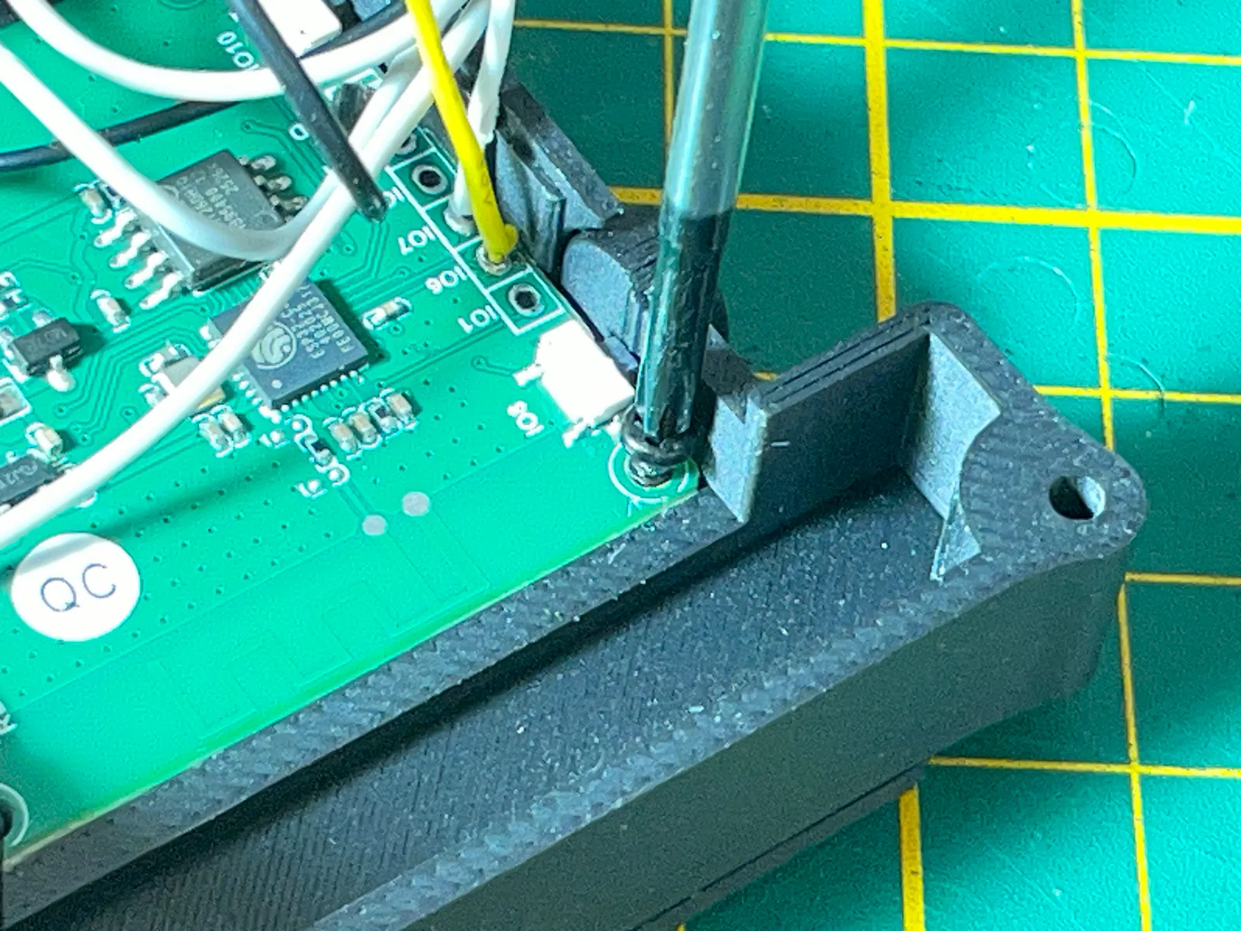 Screwing the ESP32 board into the top housing