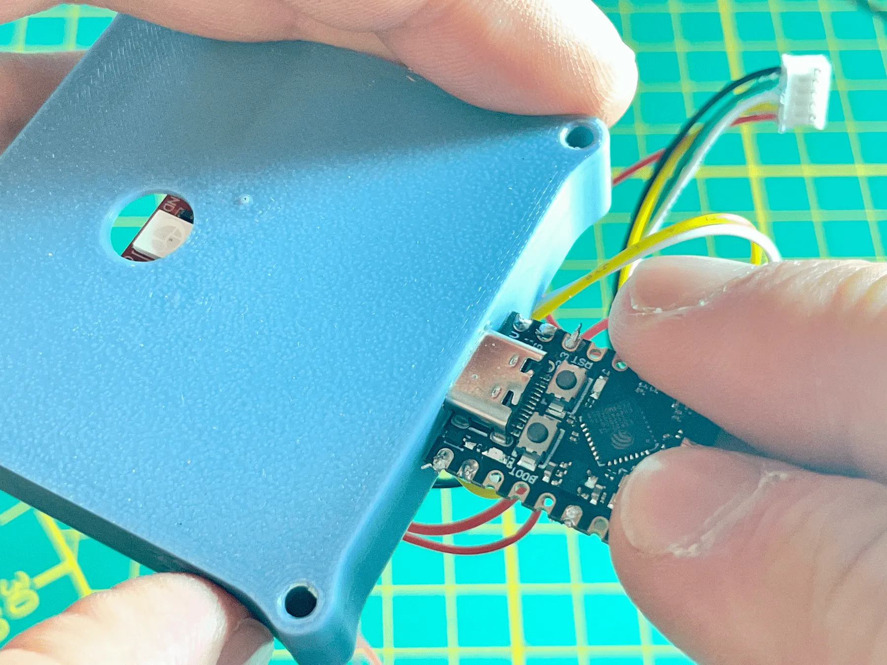 Dry fitting the ESP32 USB connector from outside the enclosure