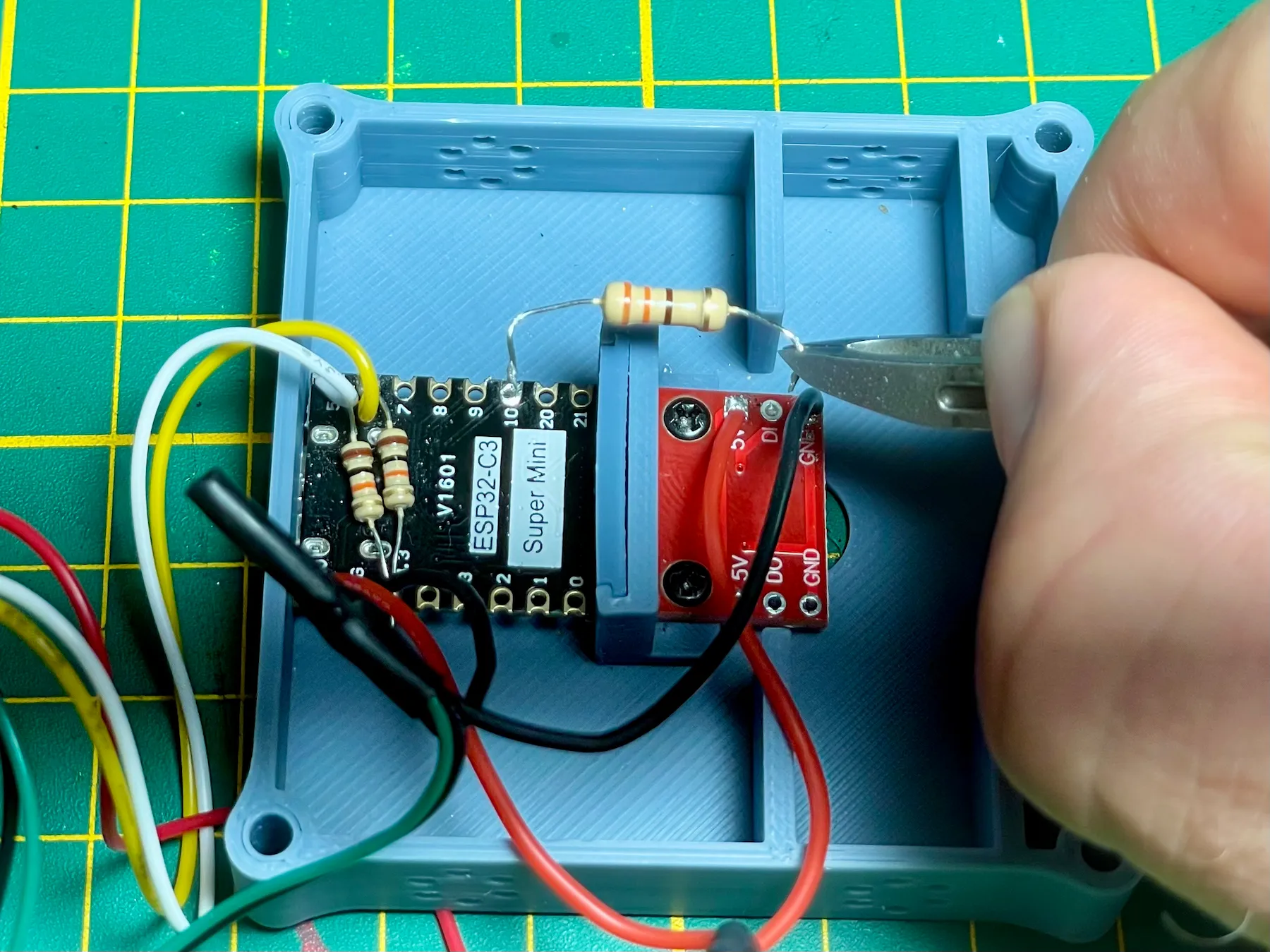 330 ohm resistor being positioned for the WS2812 data line