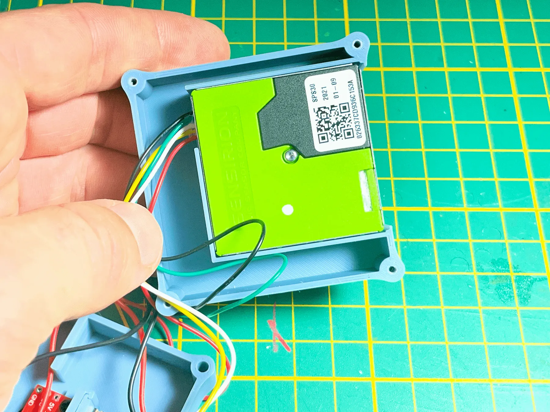 SPS30 particulate matter sensor placed into the upper SuperMini housing