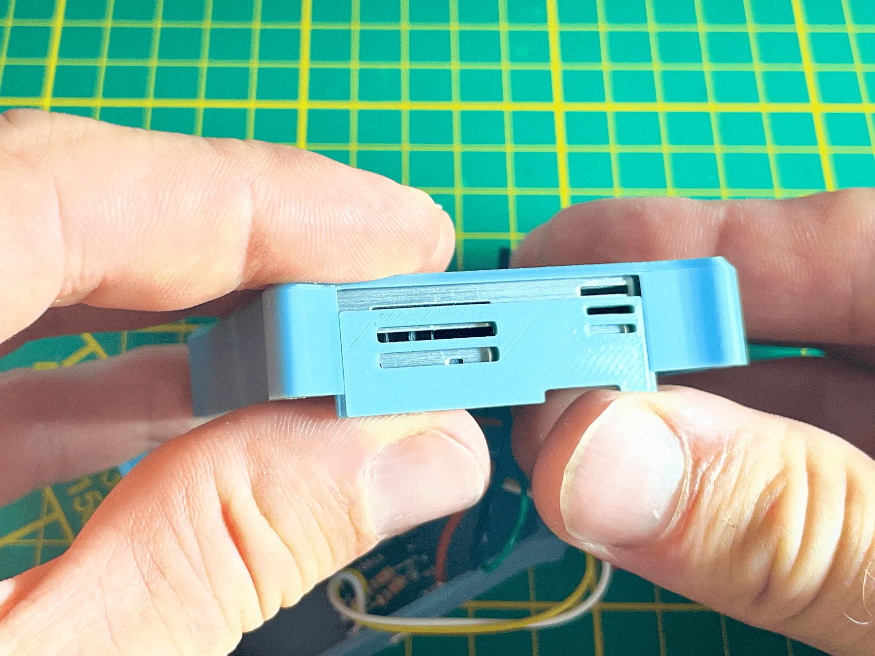 Front plate sliding into position over the SPS30 sensor