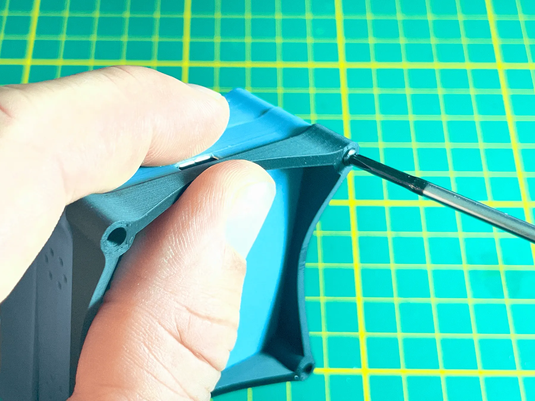 Closing the BREEZ SuperMini enclosure while guiding wires into place